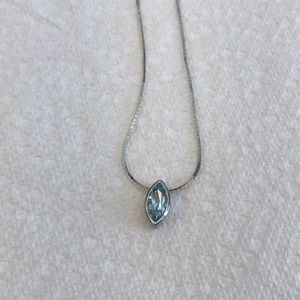 Sterling silver 18” necklace. Blue topaz gemstone encased in sterling silver